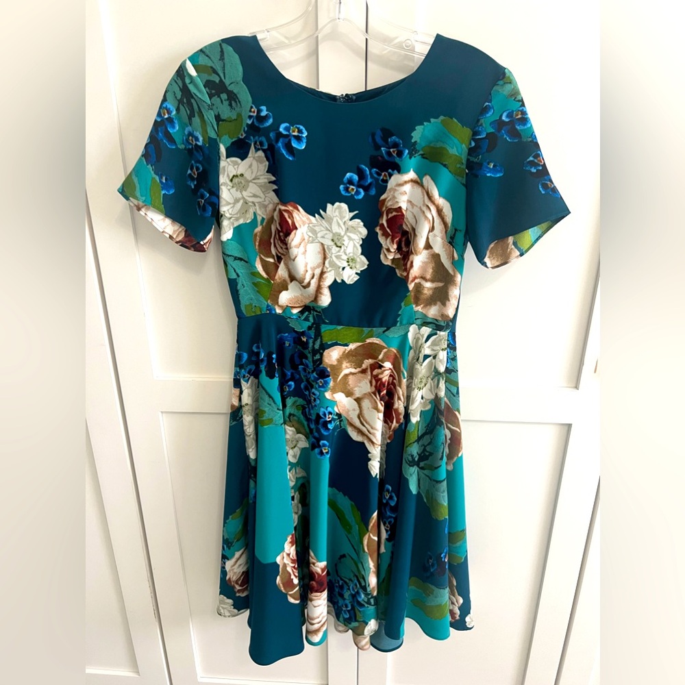 Anthropologie dress by CoreyLynnCalter. Beautiful teal shades and floral print.
